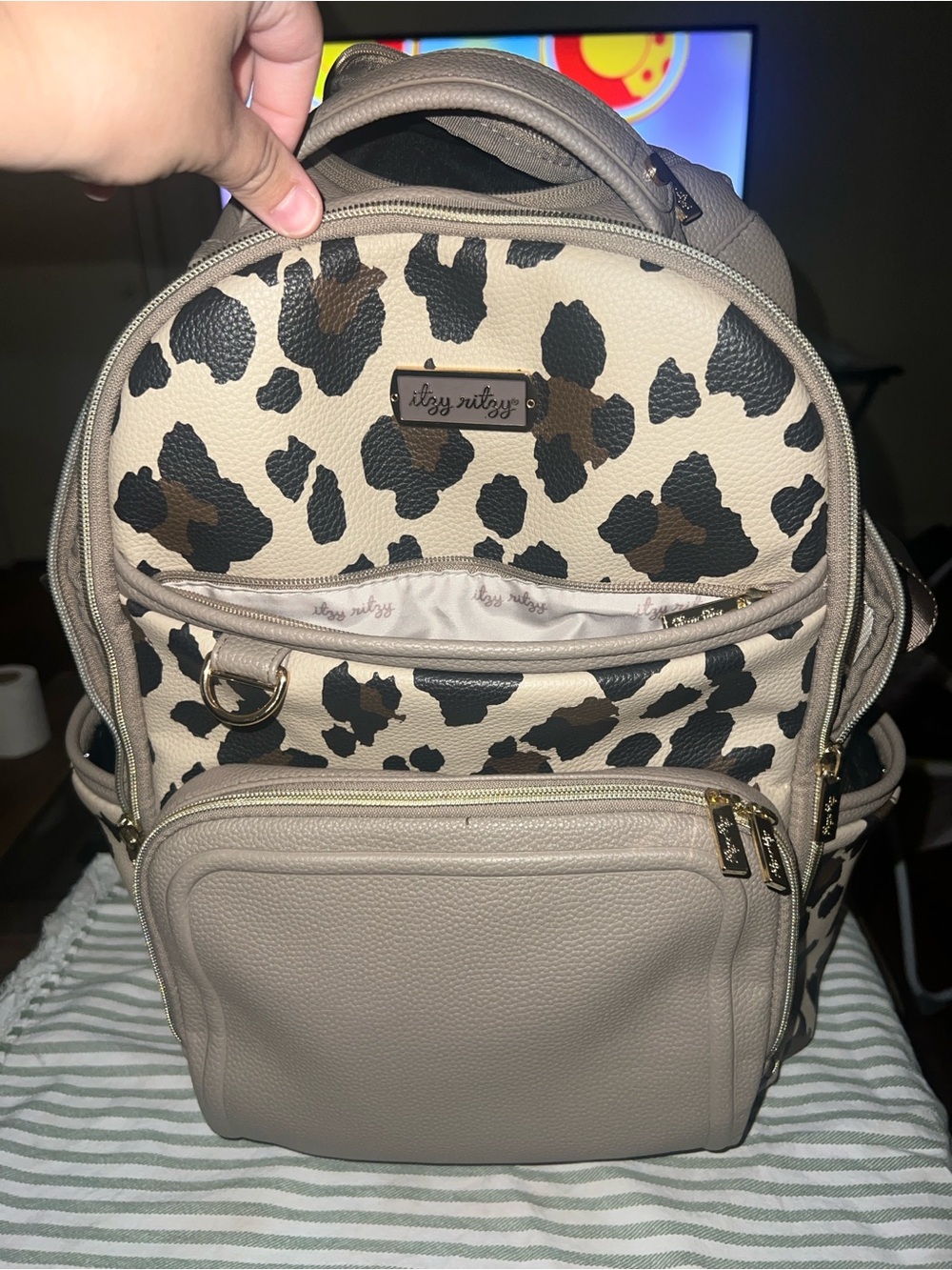 Itzy Ritzy Leopard Print Backpack in Taupe and Black